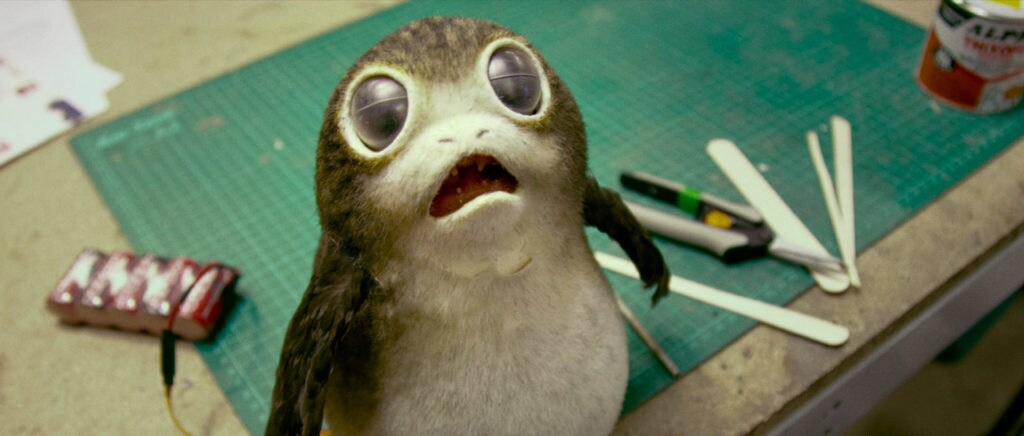 A porg prop looks surprised.