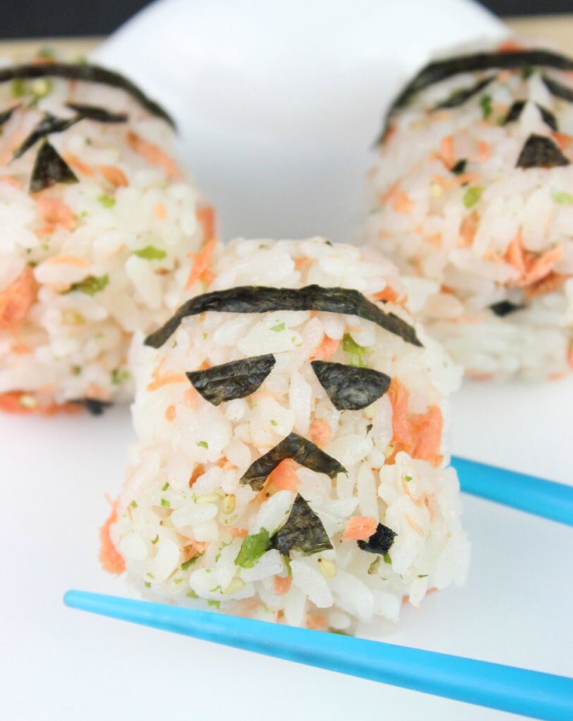 Rice ball Stormtrooper helmets made from rice and shaved salmon. The mouth and eyes are made from small pieces of seaweed.