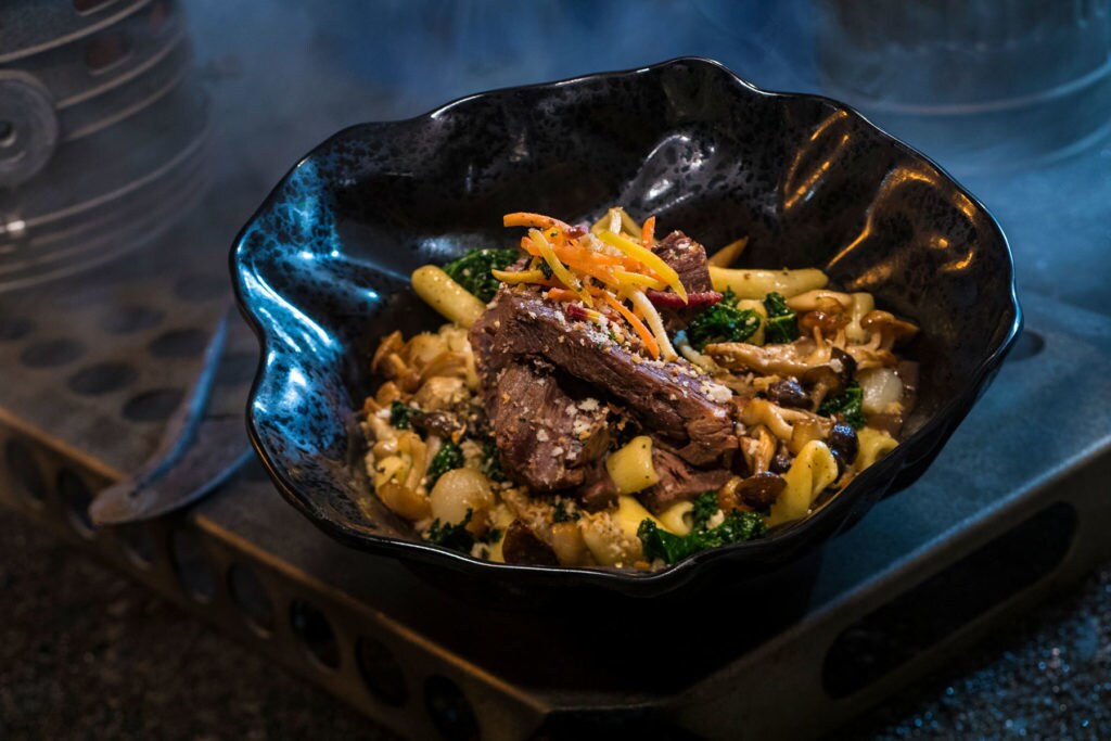 The Braised Shaak Roast, found at Docking Bay 7 Food and Cargo inside Star Wars: Galaxy’s Edge, features beef pot roast with cavatelli pasta, kale and mushrooms. (David Roark/Disney Parks)