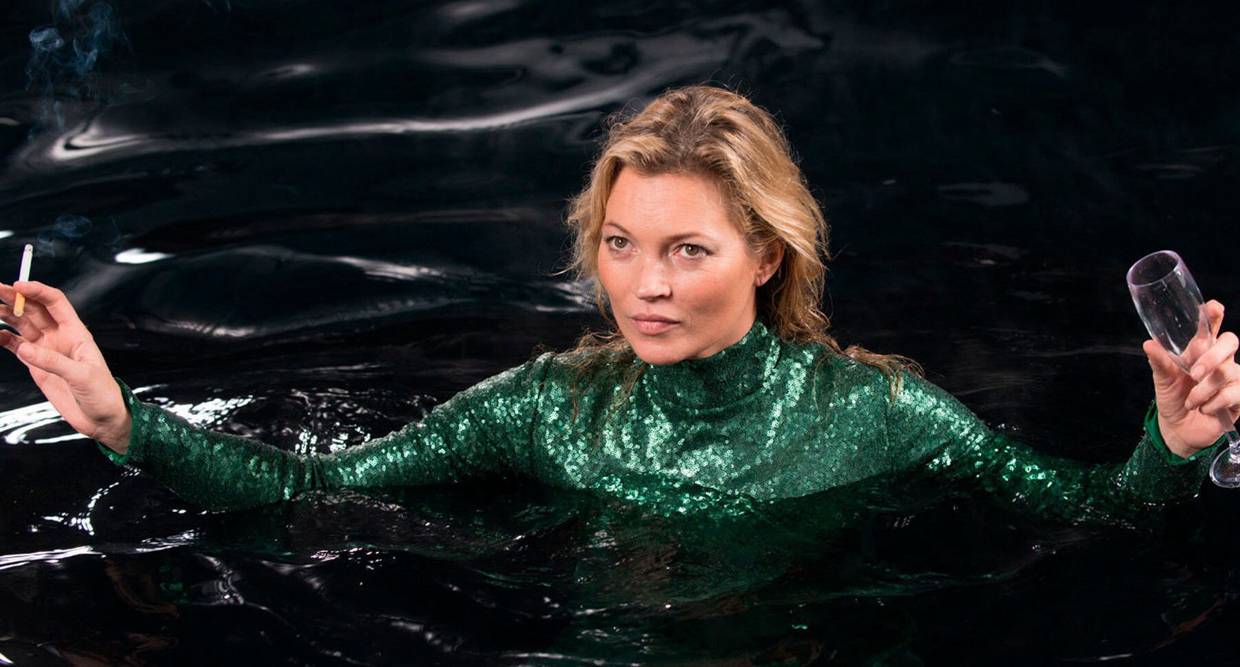 Actor Kate Moss as herself, chest deep in water in "Absolutely Fabulous: The Movie"