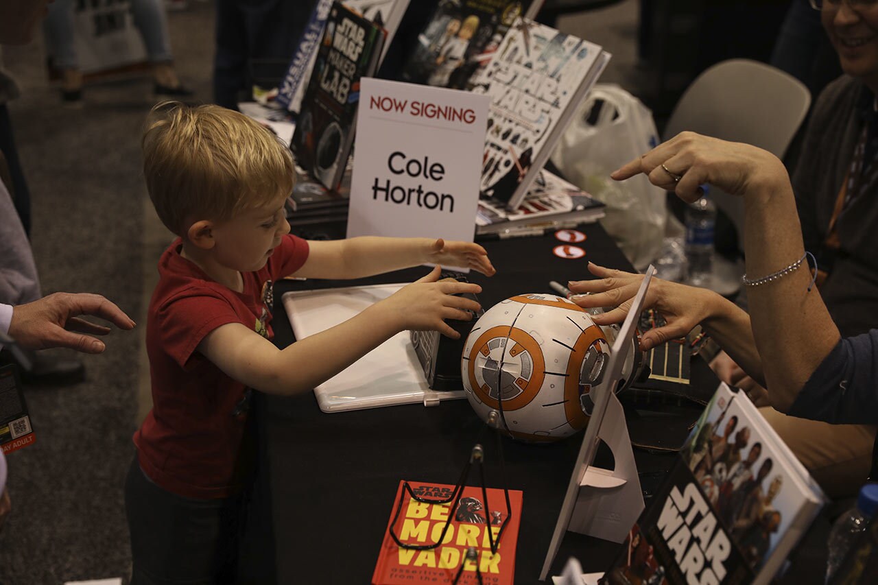 A young fan getting an autograph at Celebrations Chicago 2019
