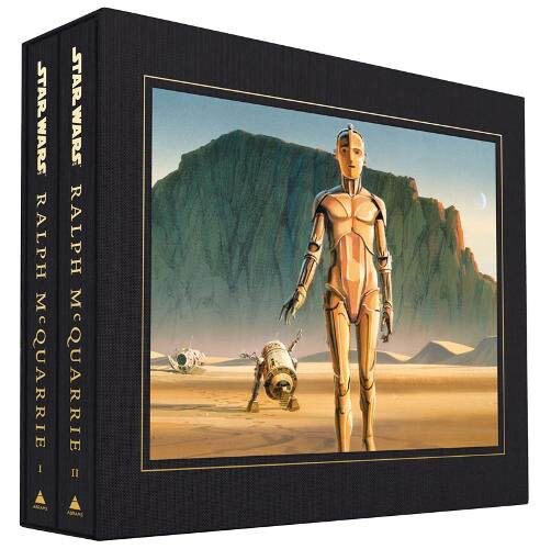 The two volumes of Star Wars Art: Ralph McQuarrie, in a case featuring early concept art of C-3PO and R2-D2.
