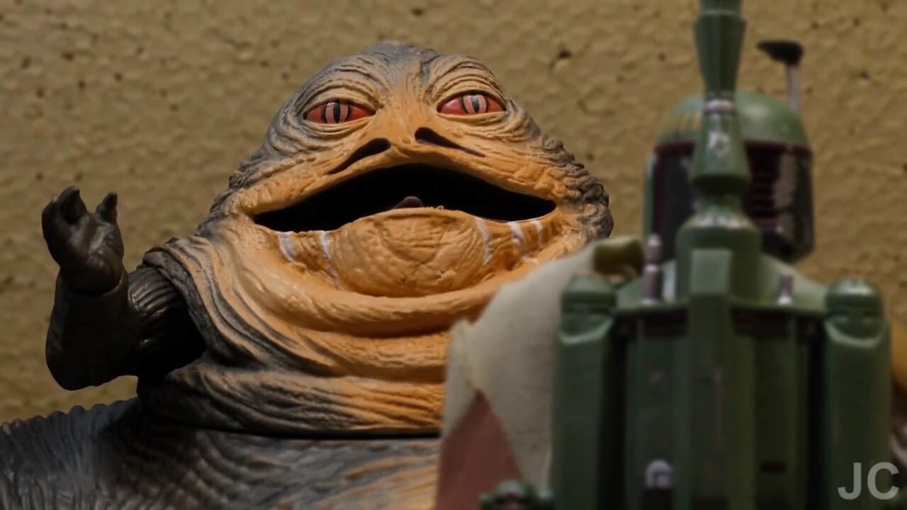 Jabba the Hutt speaks with Boba Fett in a scene from "Bounty Buddies."