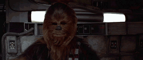 Chewbacca rests his hands behind his head in a GIF.