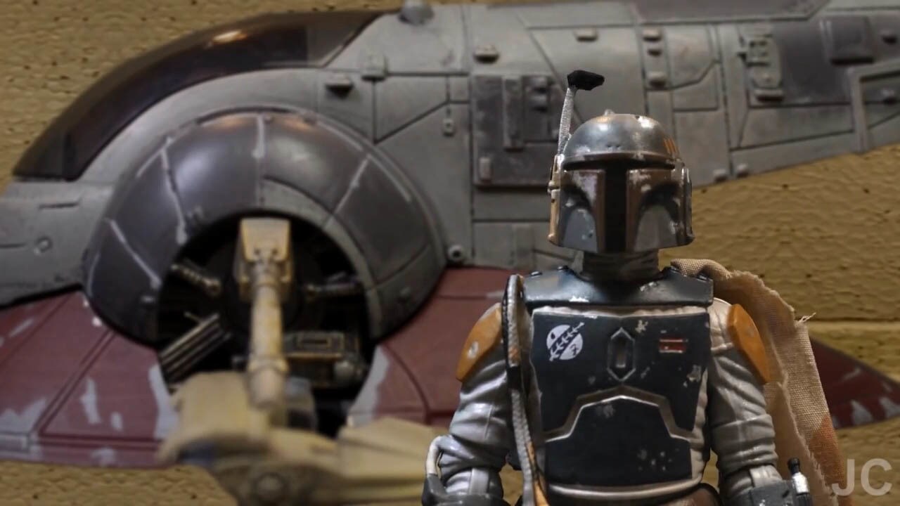 Boba Fett stands before Slave I in a scene from "Bounty Buddies."