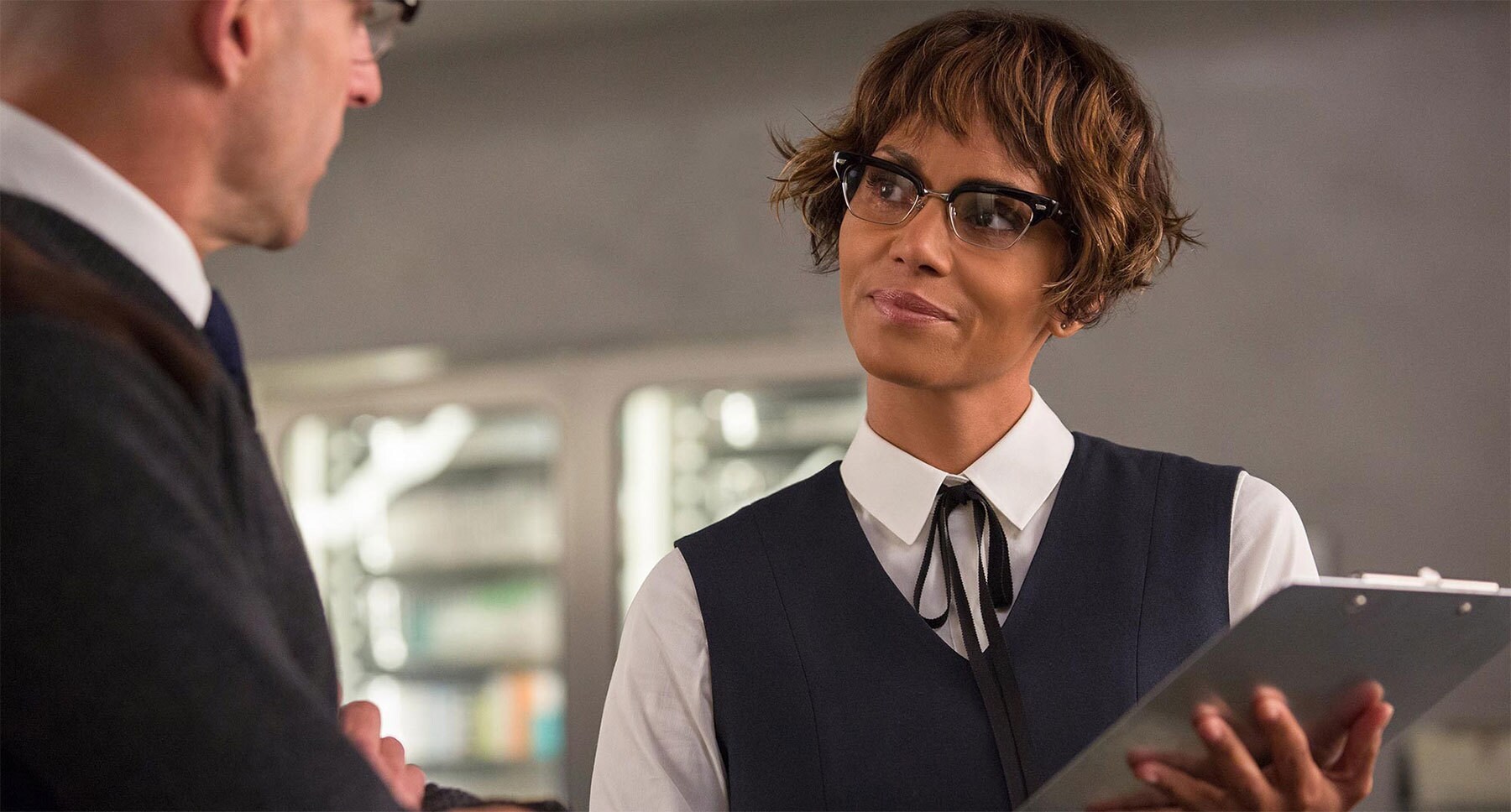 Halle Berry (as Ginger) and Mark Strong (as Merlin) in Kingsman: The Golden Circle