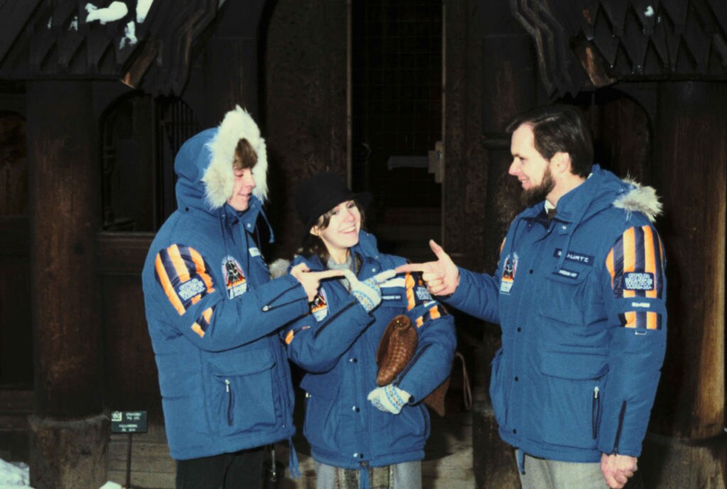 Mark Hamill, Carrie Fisher, and producer Gary Kurtz in their Empire crew parkas.