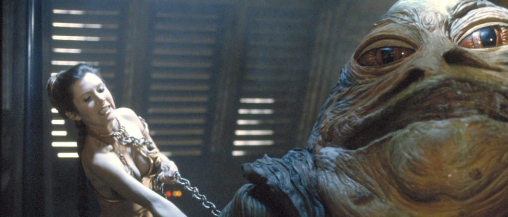 Princess Leia strangles Jabba the Hutt with chains in Return of the Jedi.