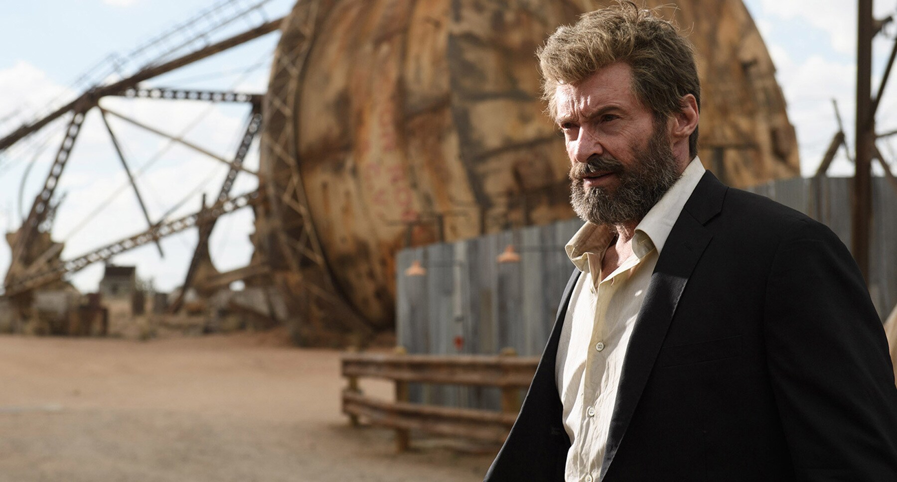 Hugh Jackman (as Logan) in an abandoned area in "Logan"
