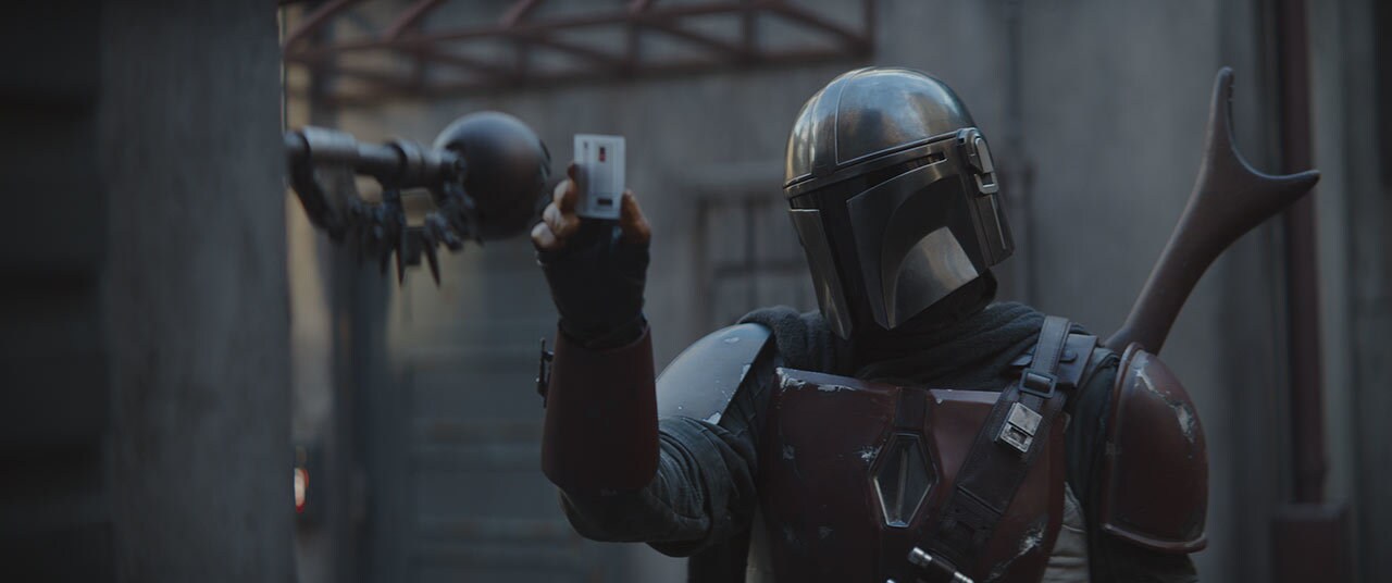 The Mandalorian showing his identification