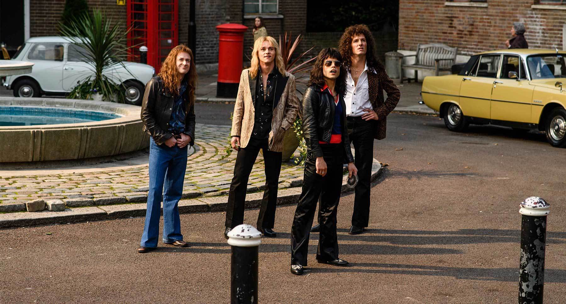 Rami Malek (as Freddie Mercury) Gwilym Lee (as Brian May), Ben Hardy (as Roger Taylor), and  Joseph Mazzello (as John Deacon) in the movie "Bohemian Rhapsody"