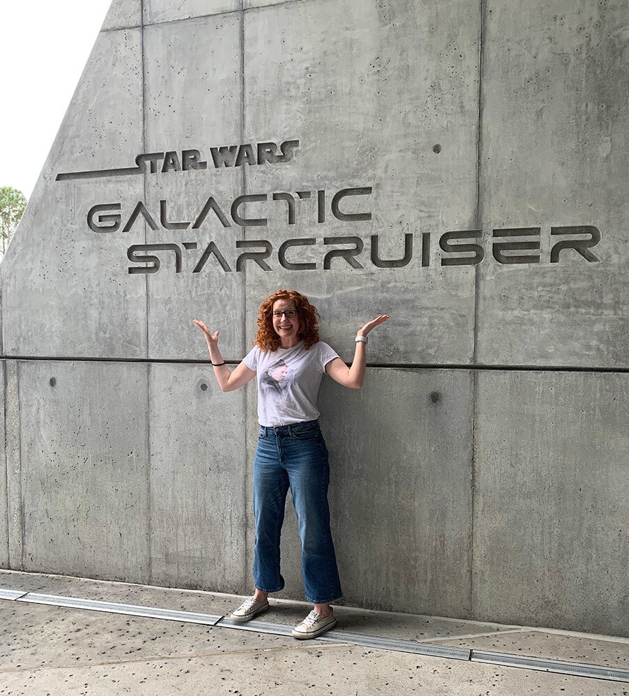 Kristin Baver in front of Galactic Starcruiser