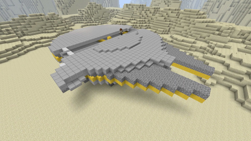 A partially built block Millennium Falcon in Minecraft.