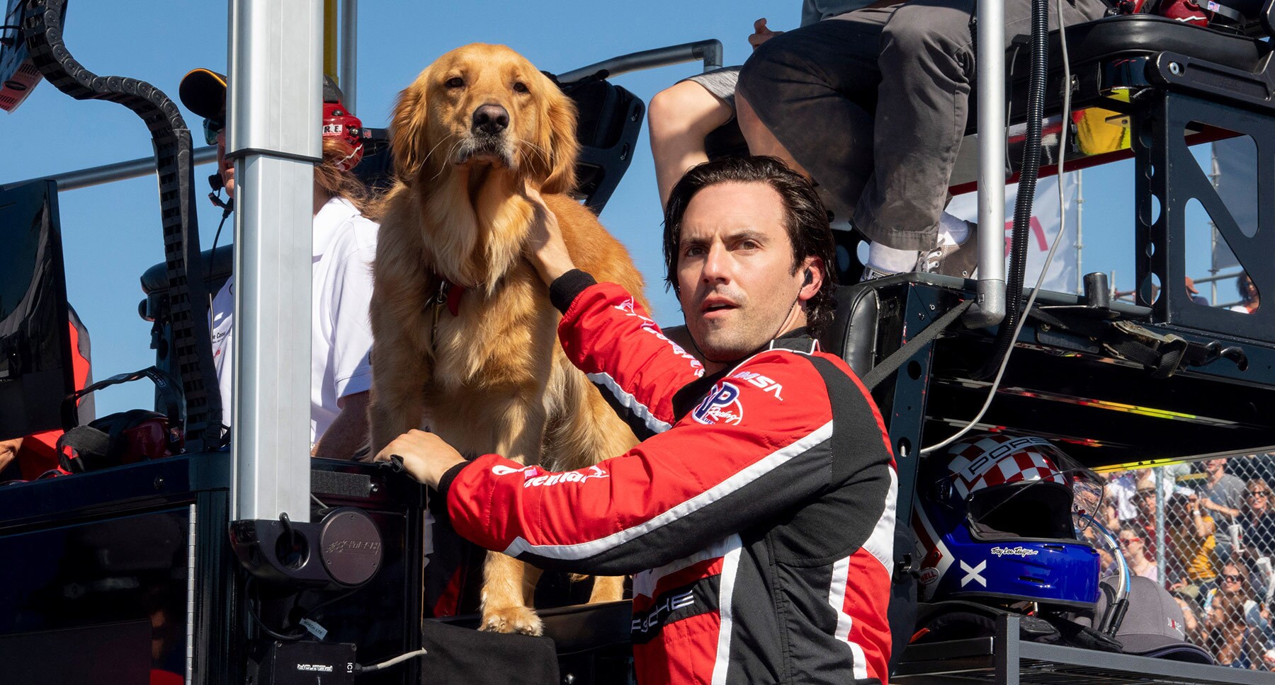 Denny (Milo Ventimiglia) and dog Enzo in the movie "The Art of Racing in the Rain"