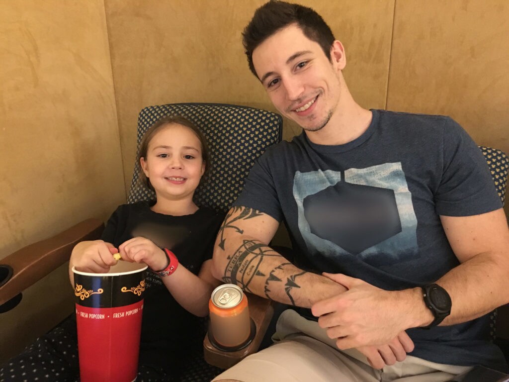 Isaiah Dasen and his daughter Eva attending a showing of 