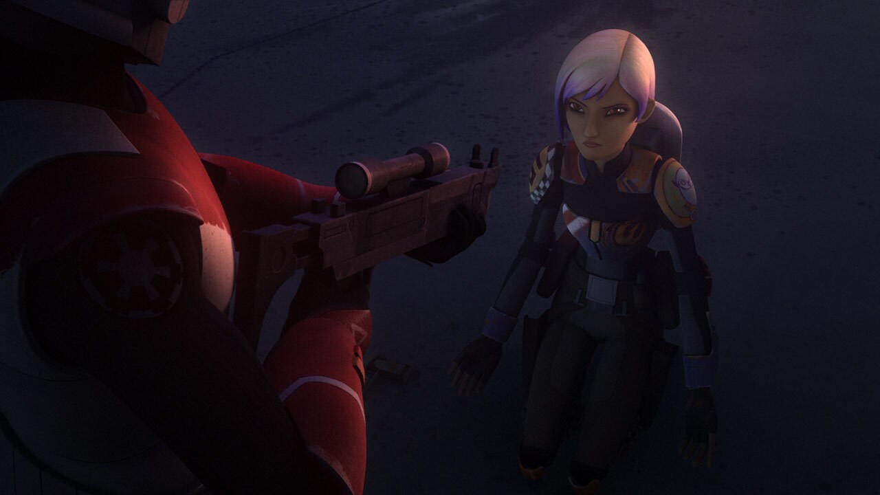 Sabine Wren kneels in front of a blaster rifle wielded by an Imperial officer in Star Wars Rebels.