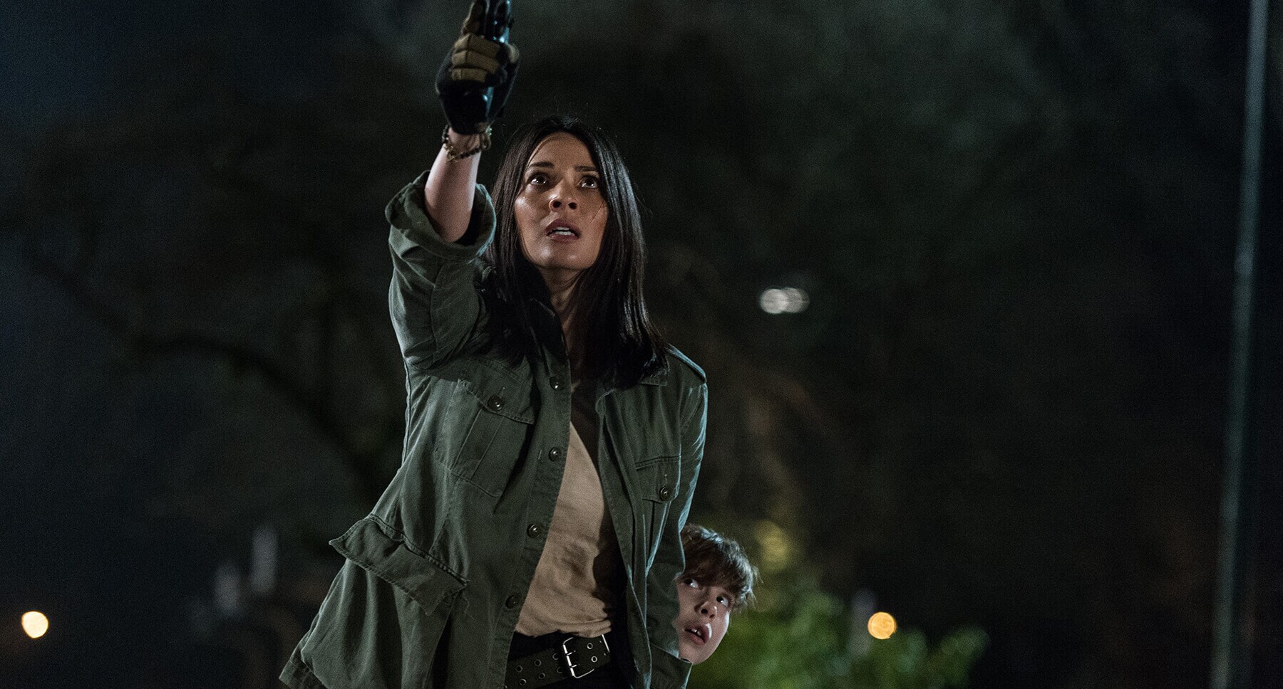 Olivia Munn and Jacob Tremblay in "The Predator"