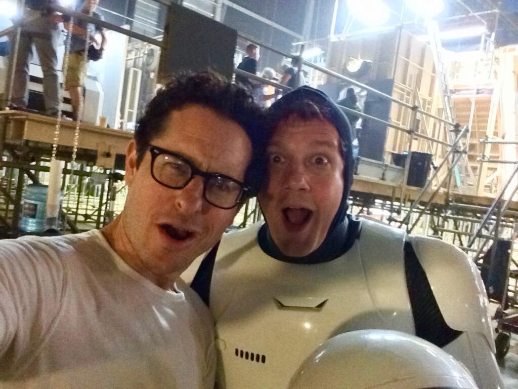 Rogue One: A Star Wars Story composer Michael Giacchino on set as a stormtrooper with The Force Awakens director J.J. Abrams.