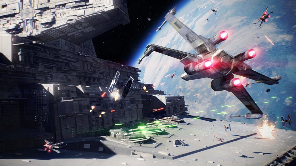 An X-wing shoots at a TIE fighter in Battlefront II.