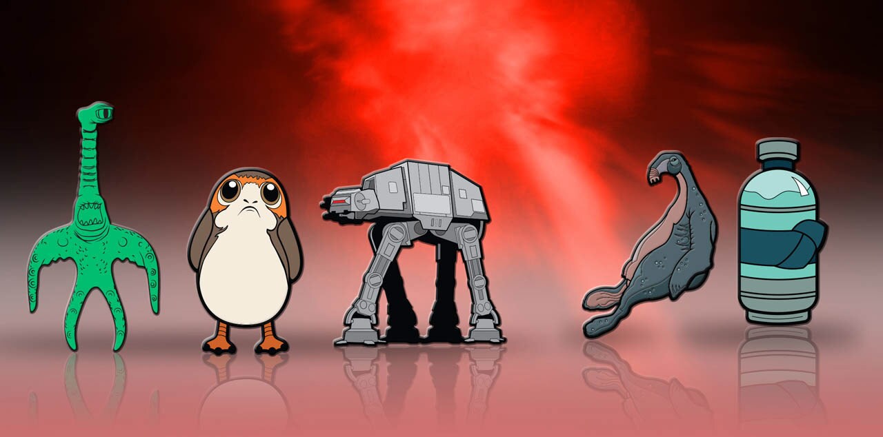 A set of vividly colored Star Wars enamel pins, including a porg and an AT-AT.