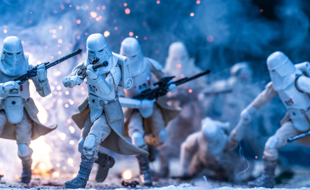 Stormtrooper toys posed in a wintery battle.