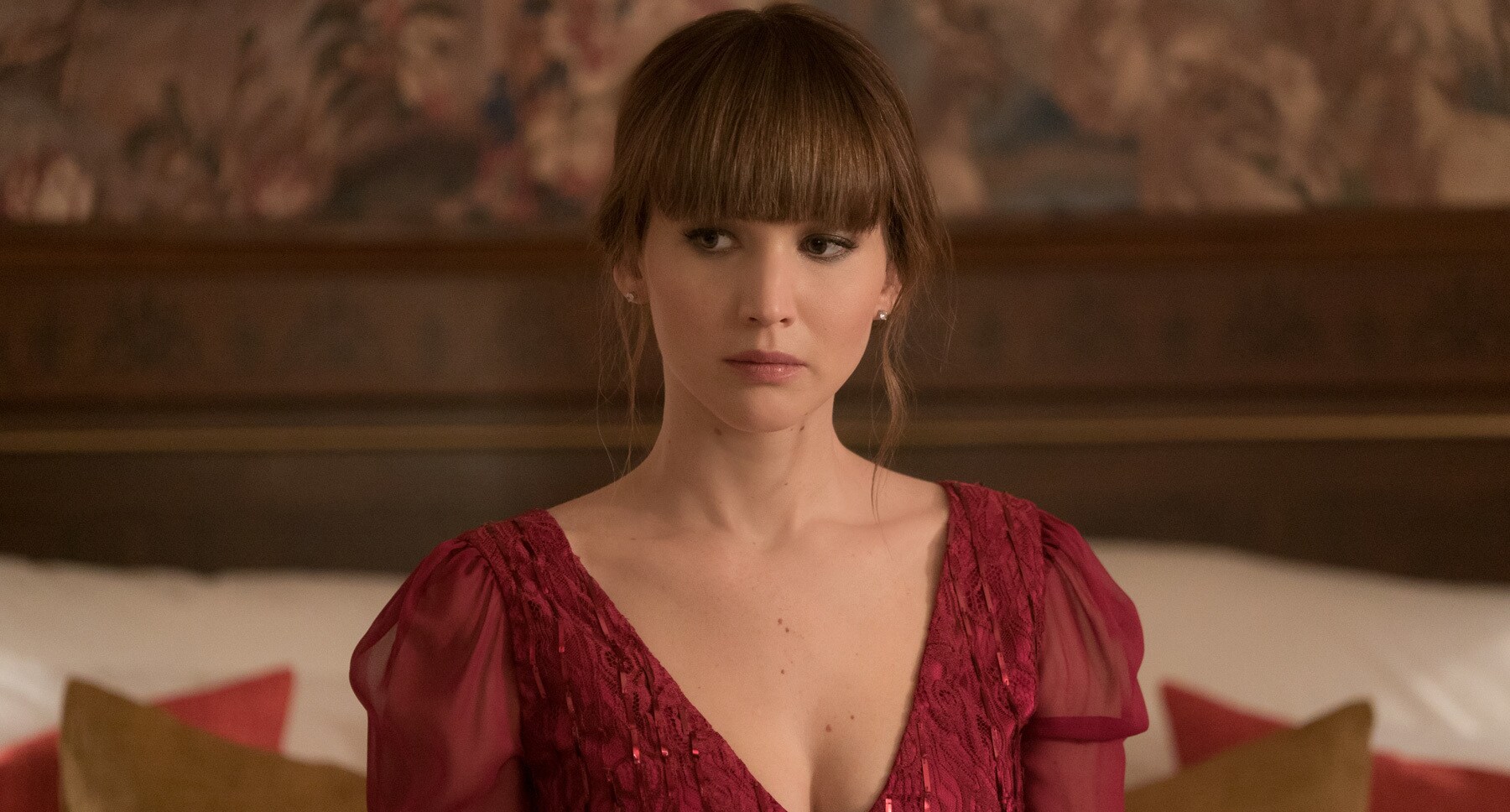 Jennifer Lawrence (as Dominika Egorova) in a red dress in "Red Sparrow"