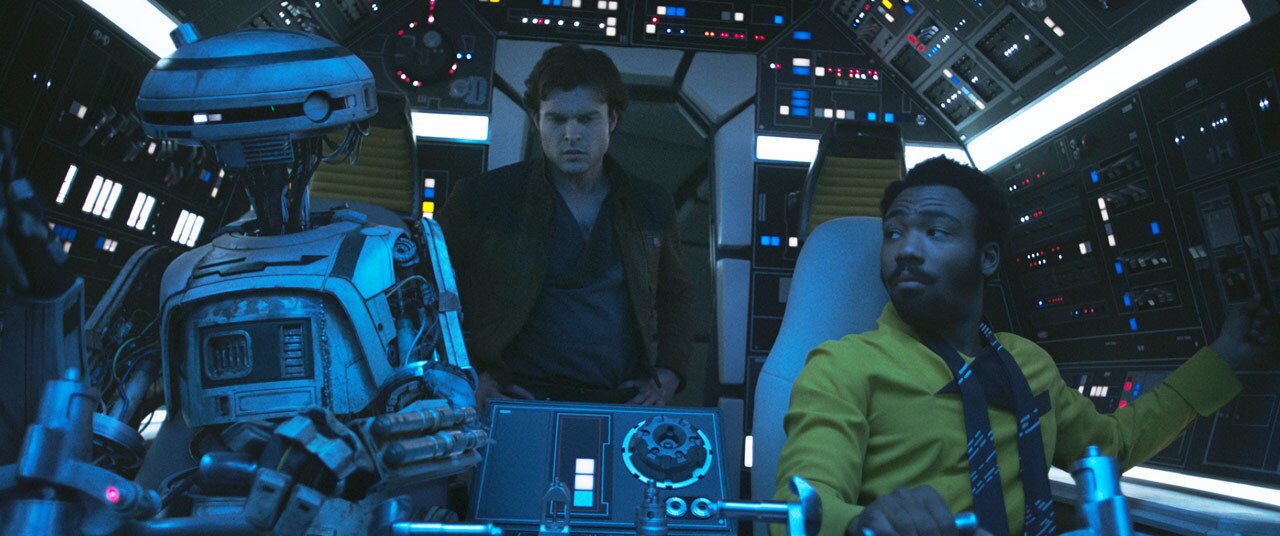 Han, Lando, and L3-37 fly the Millennium Falcon.