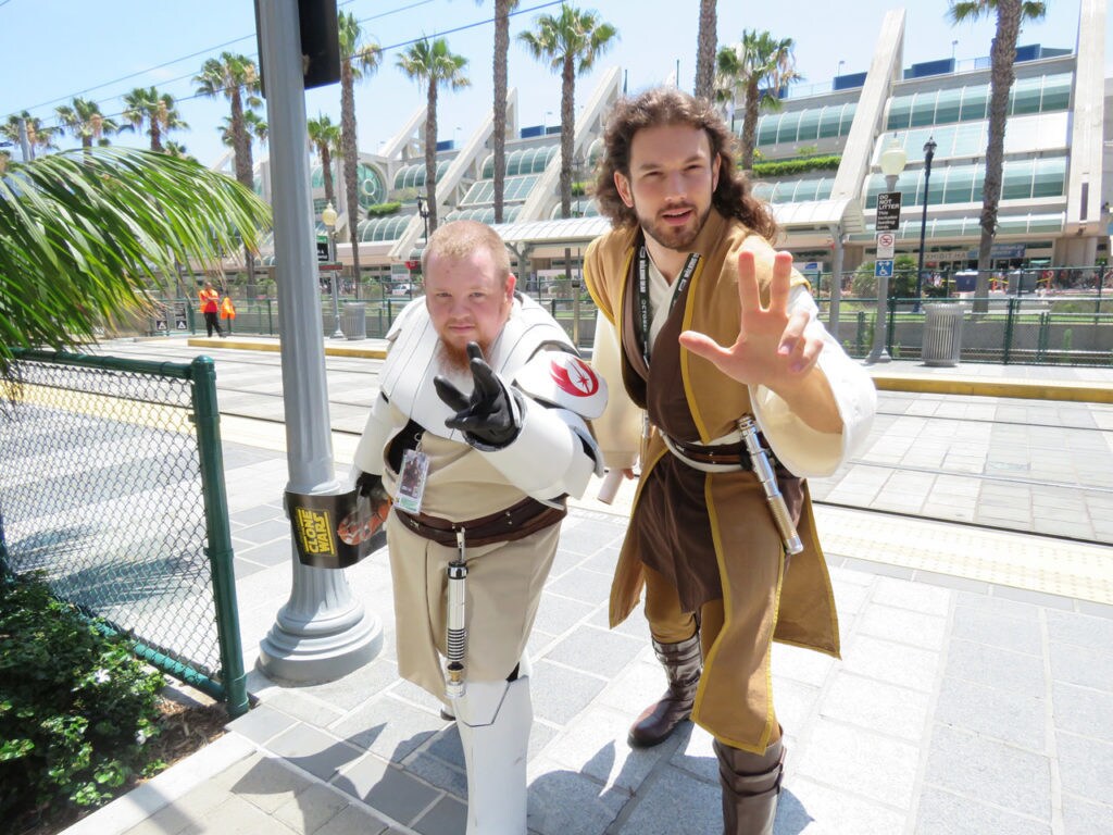 Cosplayers Michael Vernon (dressed as a Jedi) and Chris Pagliuca (dressed as Obi-Wan) pose outside San Diego Comic Con.