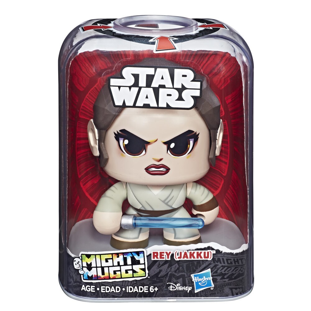 A Rey Mighty Muggs collectible figure with lightsaber in its packaging.