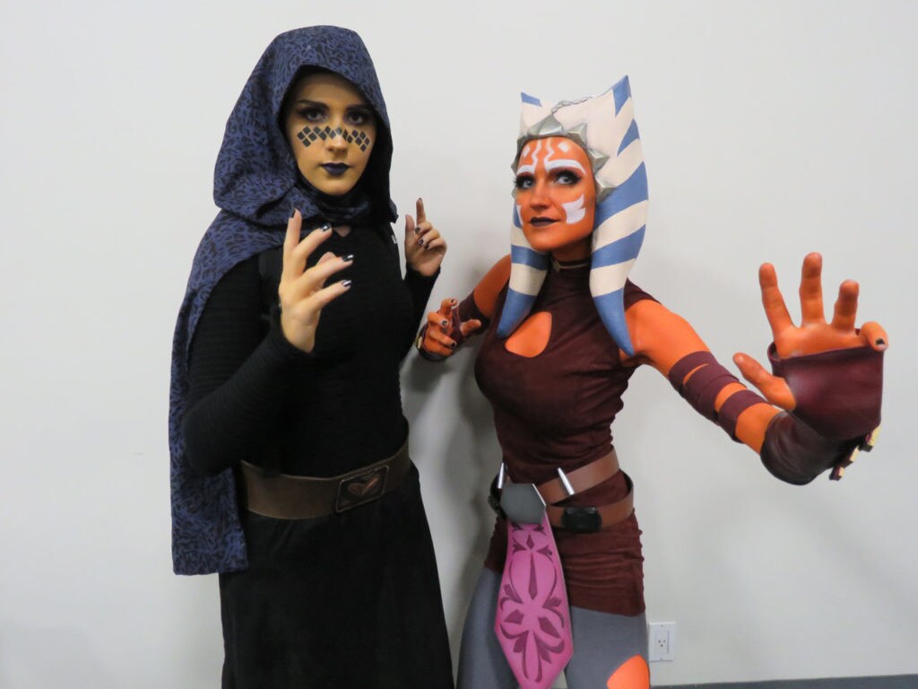 Cosplayers Rebekah Baker (dressed as Bariss Offee) and M. Blackburn (dressed as Ahsoka Tano) pose together at San Diego Comic Con.