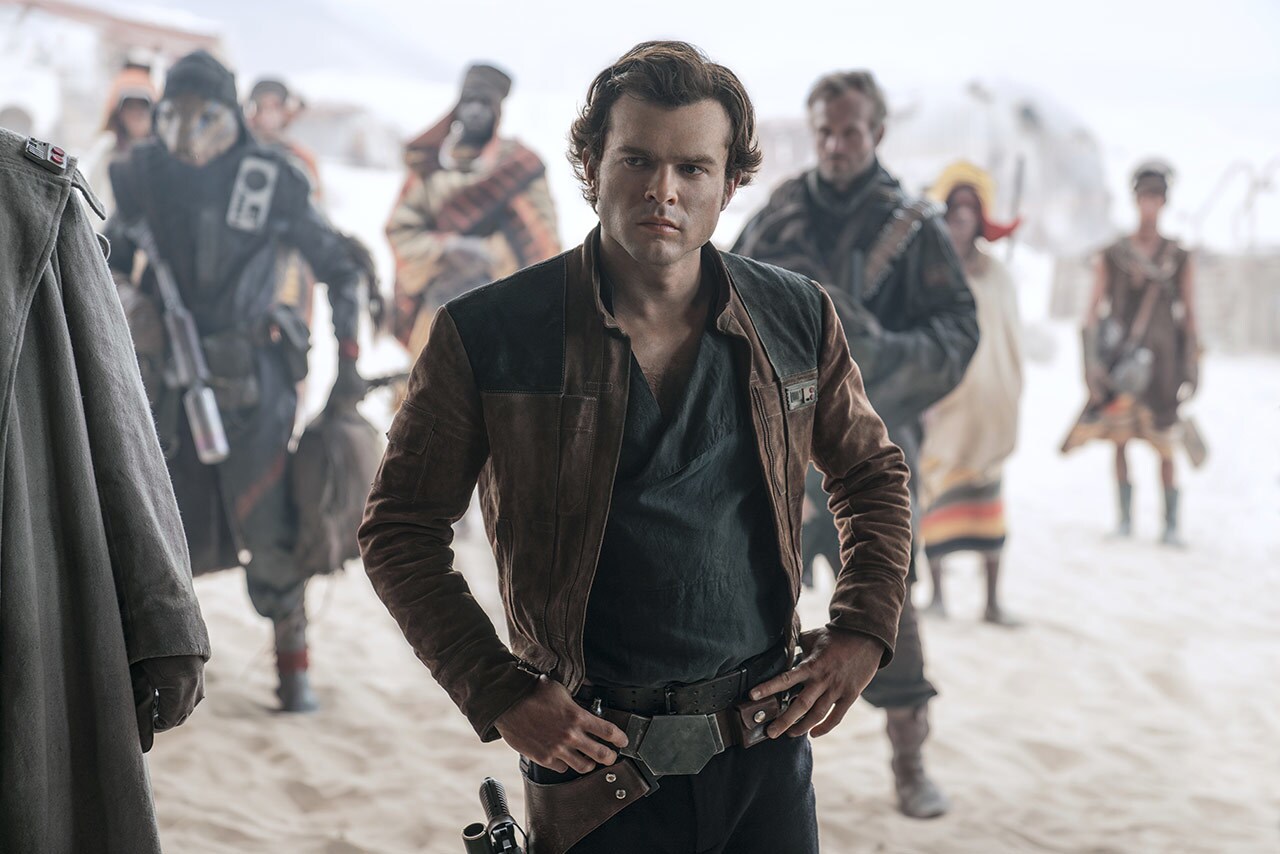 Han stands with his hands on his hips in Solo: A Star Wars Story.