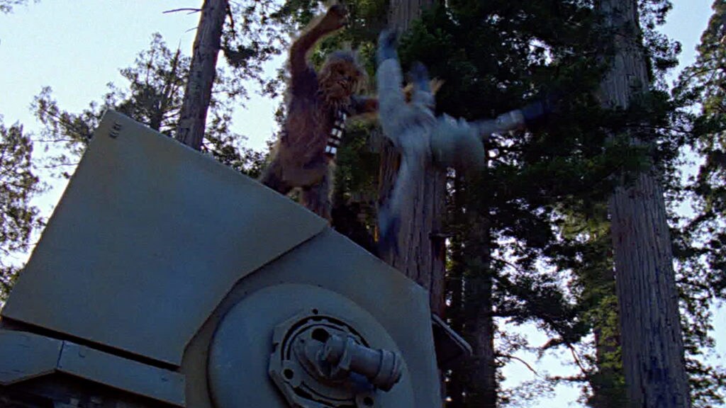 Chewbacca throws an Imperial soldier from the top of a scout walker.