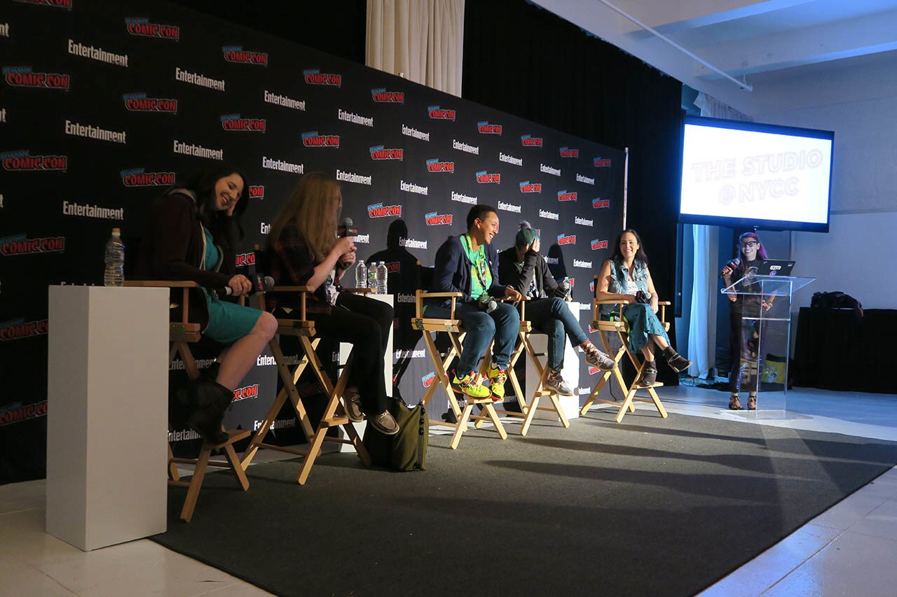 Authors are shown on a panel at NYCC 2018.