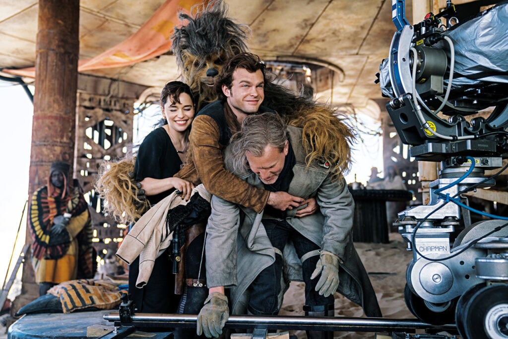 The cast laughs behind the scenes of Solo: A Star Wars Story, from the book Star Wars Icons: Han Solo.