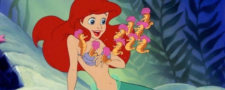 Ariel surrounded by little seahorses.