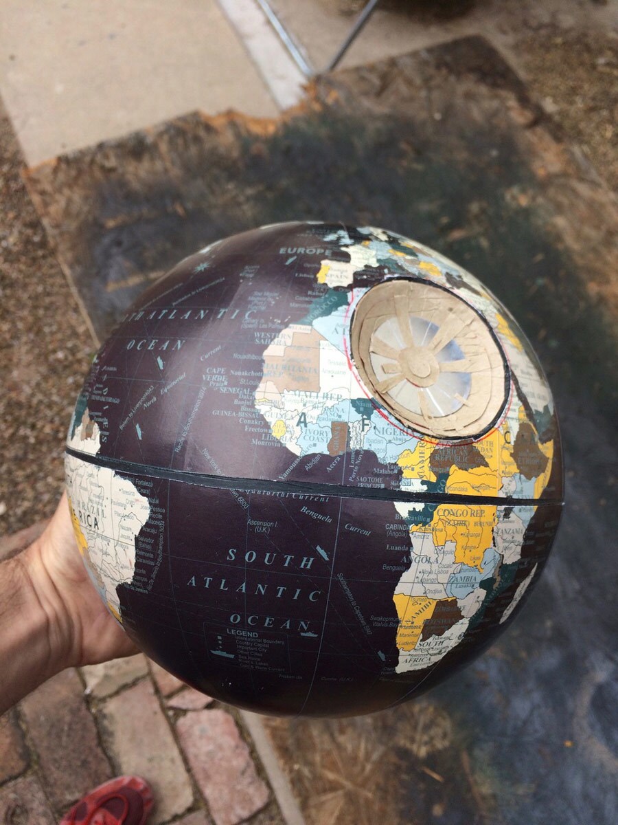 A globe of Earth in the shape of the Death Star.