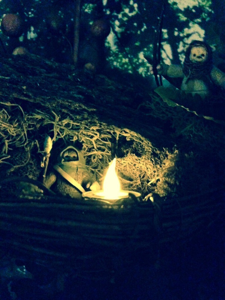 More scouts keeping watch by a campfire, this one in a platform up in the trees.