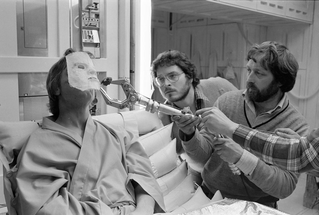 Lawrence Kasdan, Rone Hone, and Mark Hamill on the set of The Empire Strikes Back.