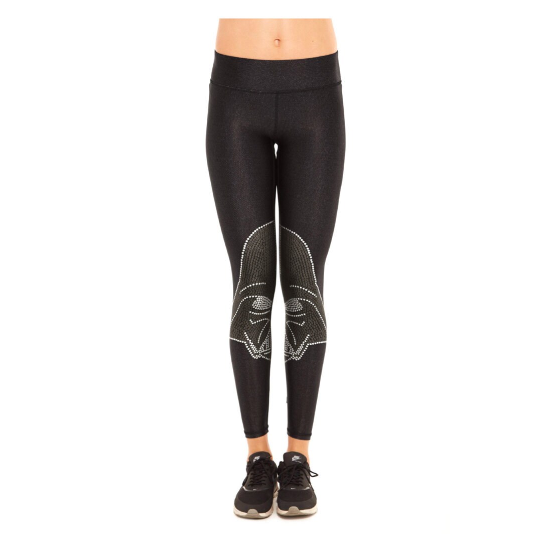 Black Star Wars leggings, by activewear company Terez, show half of Darth Vader's face on each leg, forming his full face when the legs are together.