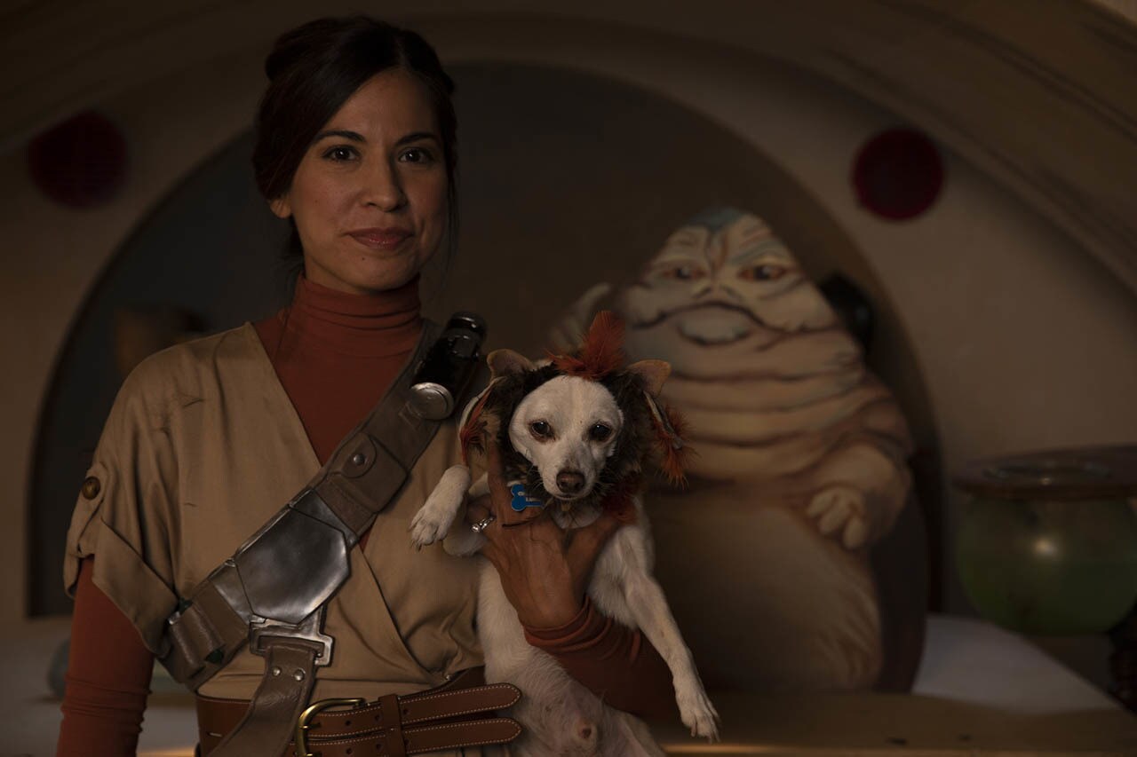 Jennifer Landa in a Star Wars costume with her dog, Chuy, dressed as Salacious Crumb.