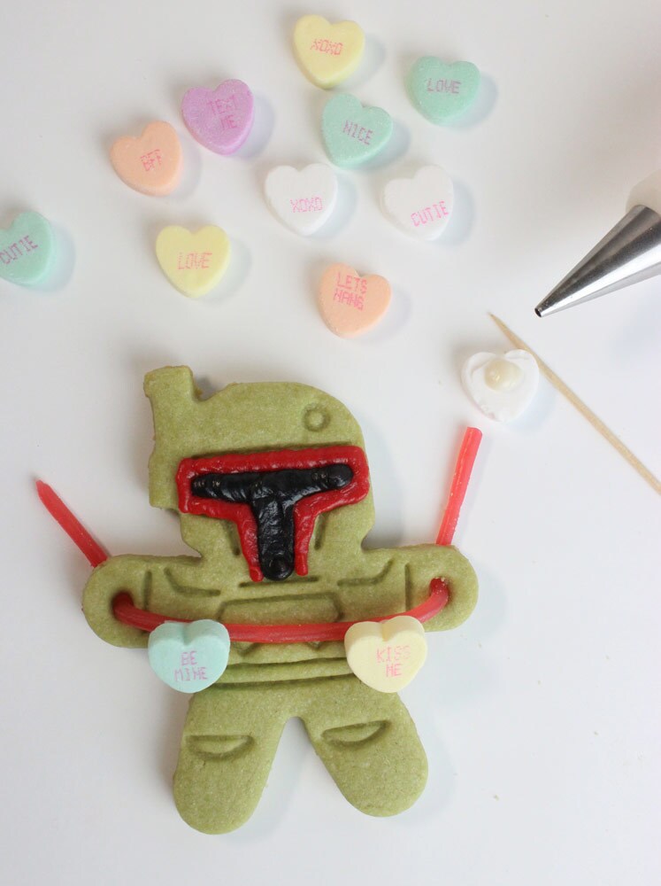 Adding candy hearts to Boba Fett Valentine Heart String Cookies