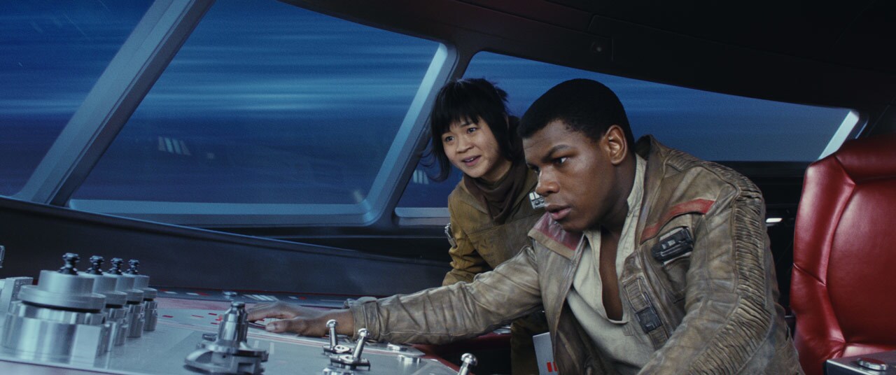 Finn and Rose Tico pilot a ship through hyperspace.