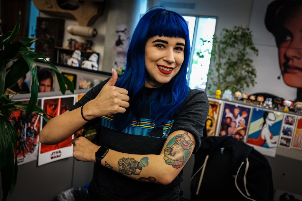 Amanda Jean Camarillo of Lucasfilm showing off her Star Wars tattoos.