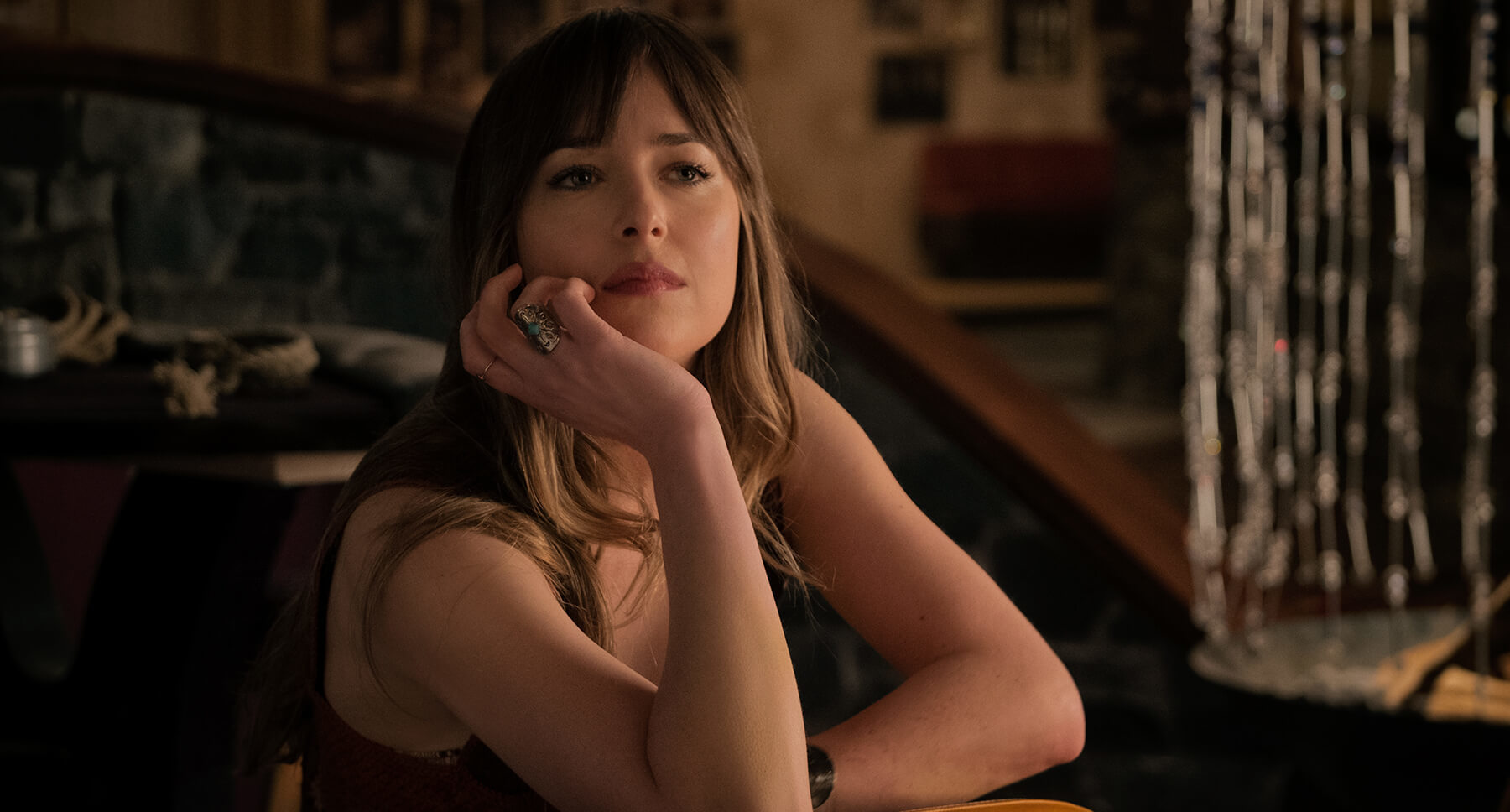 Dakota Johnson (as Emily Summerspring) in the movie "Bad Times In The El Royale