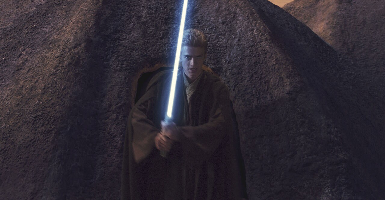 Anakin holding a lightsaber, ready to fight in Episode II Star Wars: Attack of the Clones