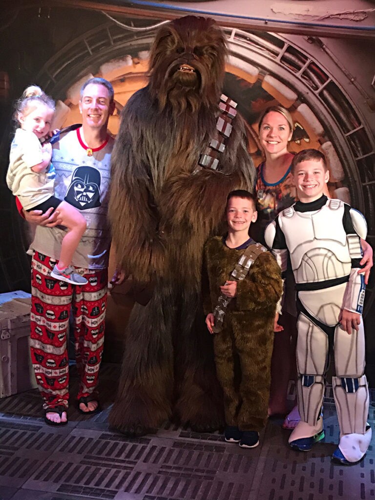 Star Wars fans the Varcoes with Chewbacca.