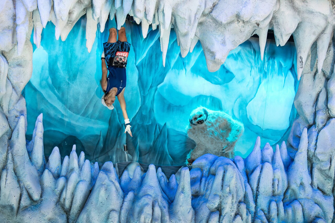 A runner at runDisney Star Wars poses for a photo in the wampa cave.