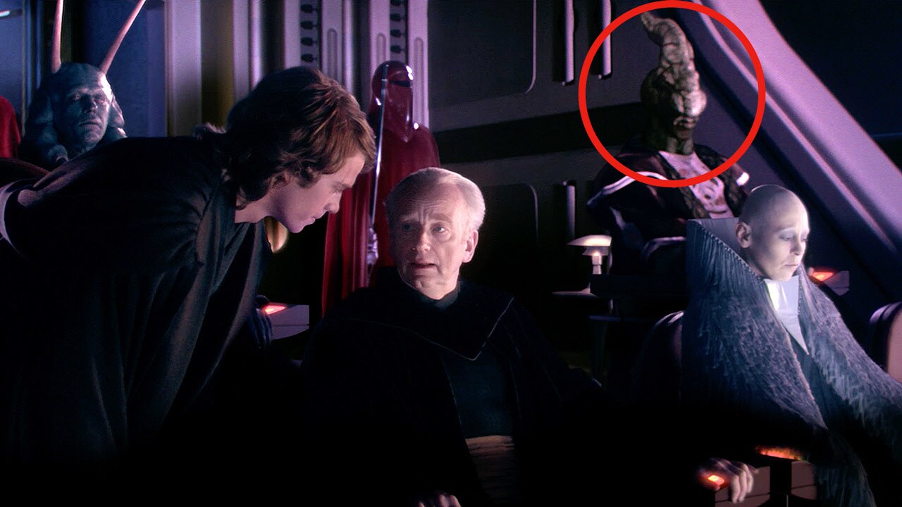Anakin speaks to Supreme Chancellor Palpatine while Sweitt Concorkill is circled with red in the background in Revenge of the Sith.