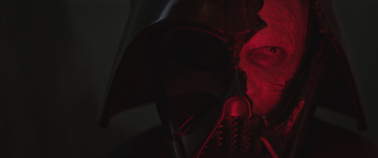 A close up of Darth Vader and his broken helmet in Part 6