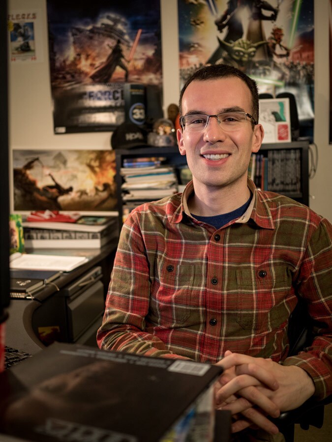 Noah Lockwood, an ILM Research and Development engineer in his office.